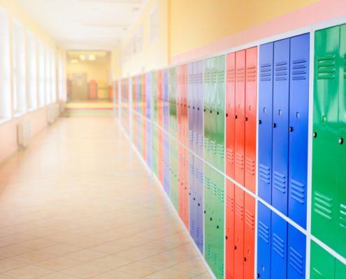 Metal Lockers in a School Hallway